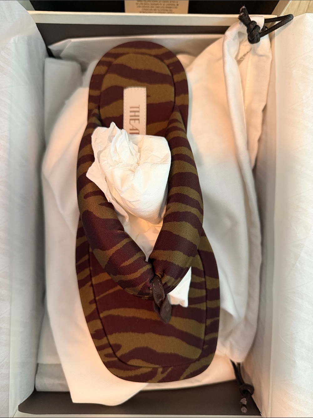 The ATTICO zebra flip flops